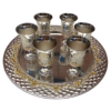 Juego de 6 copas con bandeja Diametro bandeja: 24.5 ctms. Altura copas: 7.5 ctms. Plateada con dorado Nikel